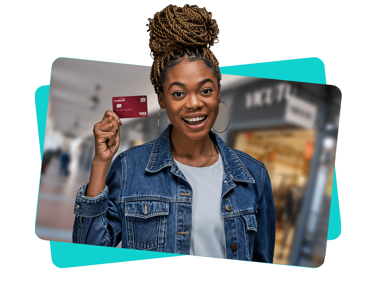 Lady smiling while holding a Credit One Bank credit card in her hand