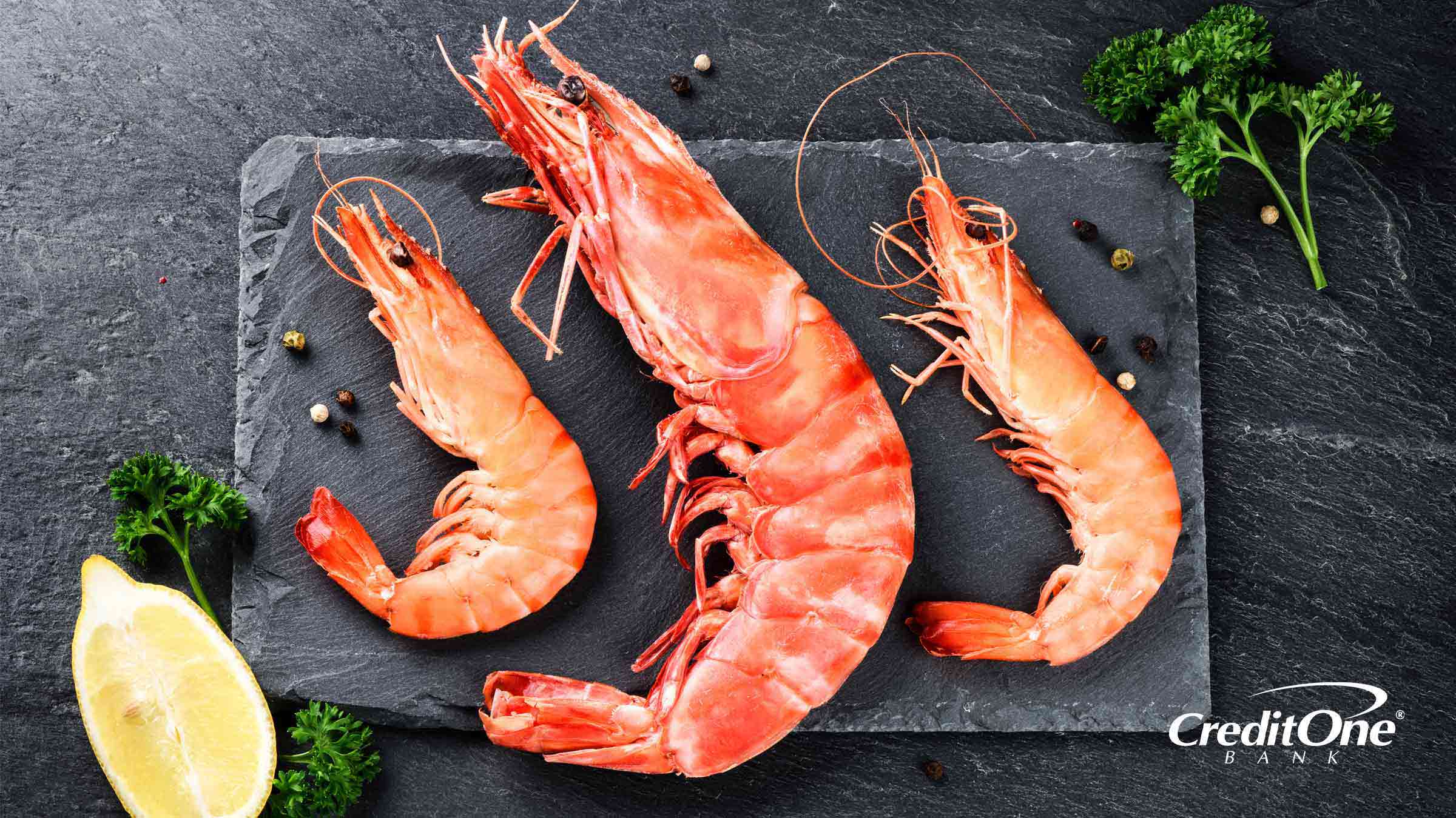 Image of three shrimp on a stone plate