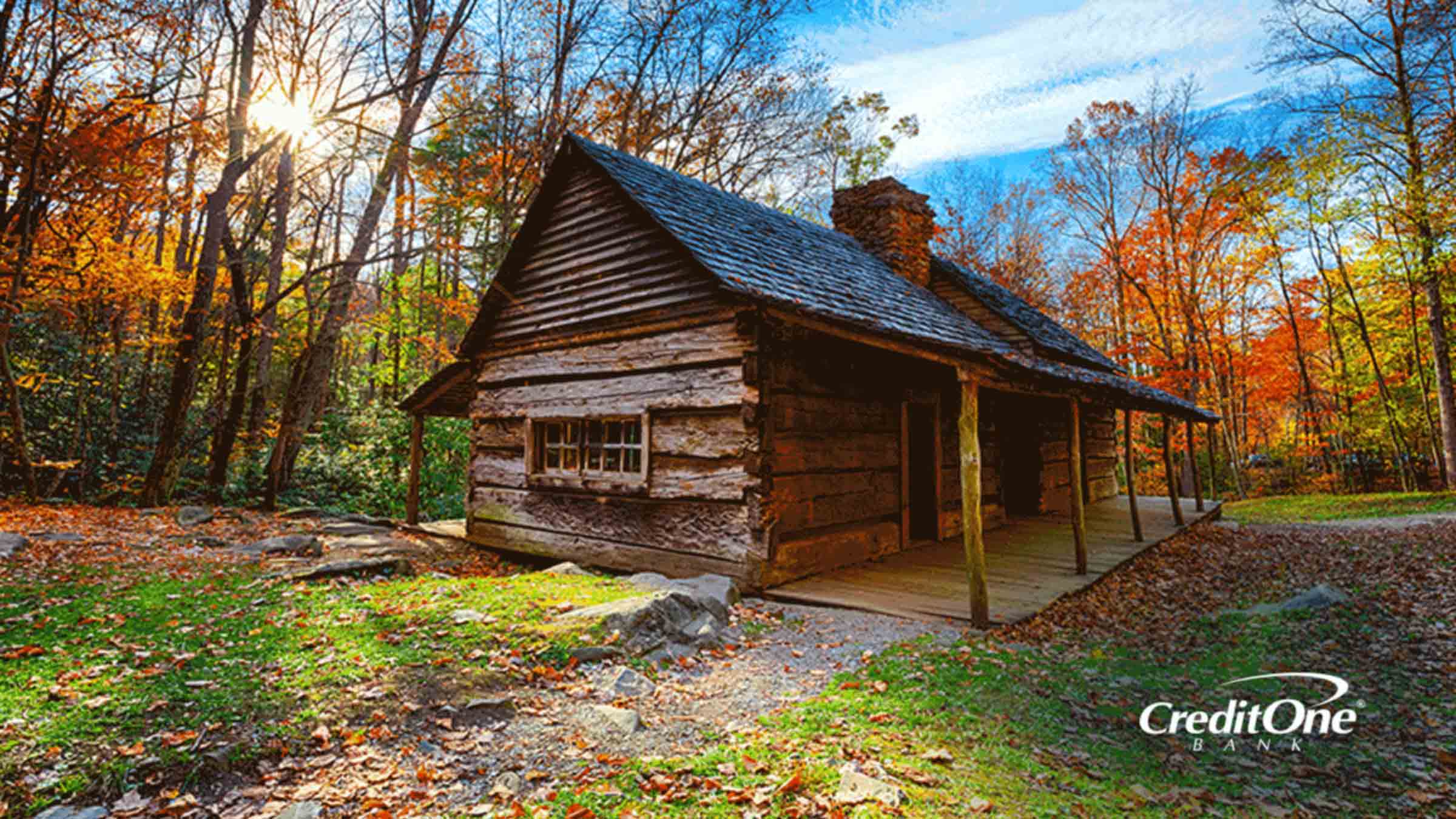 A cabin in the woods during the fall