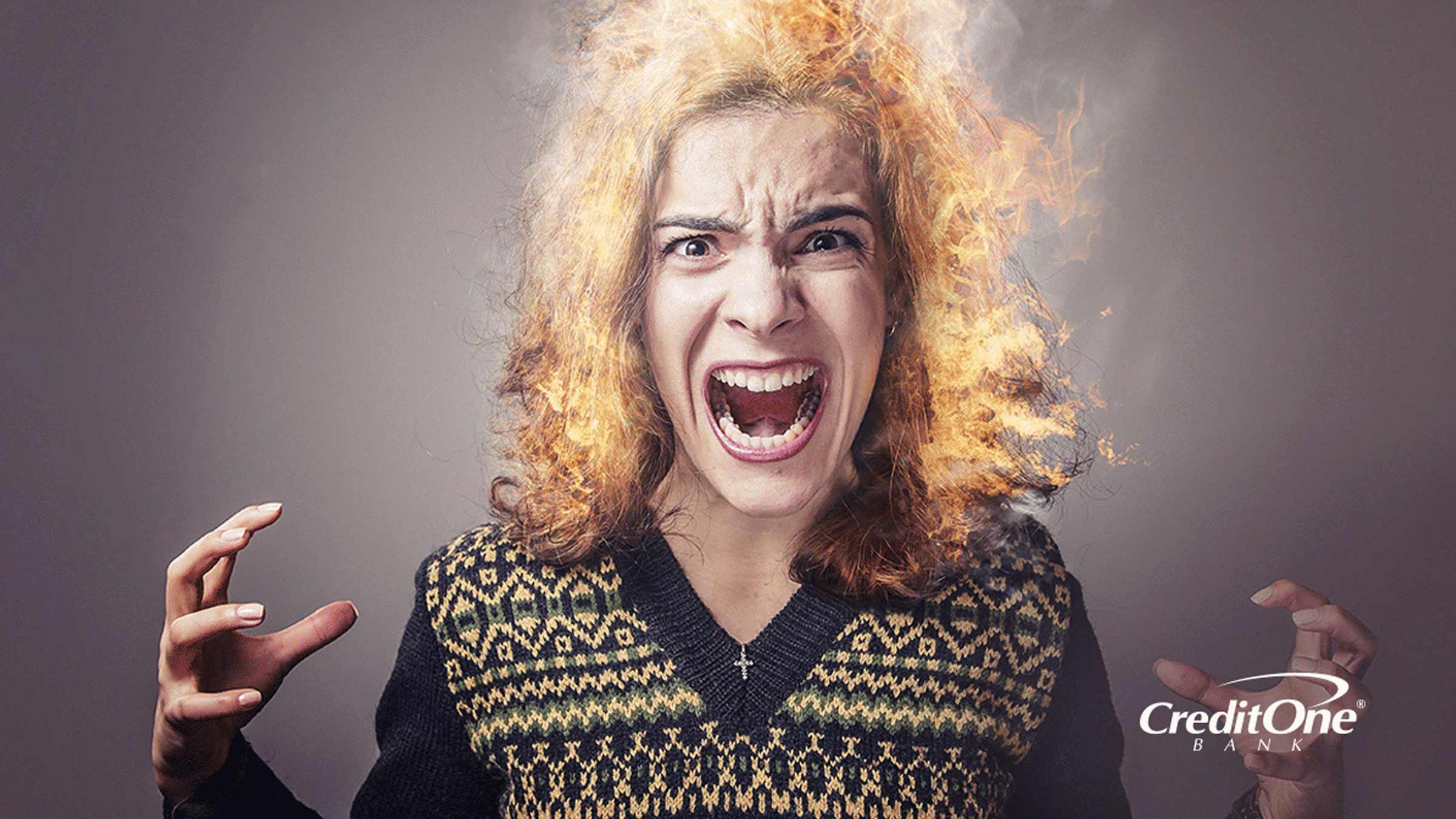A women screaming with her mouth opened