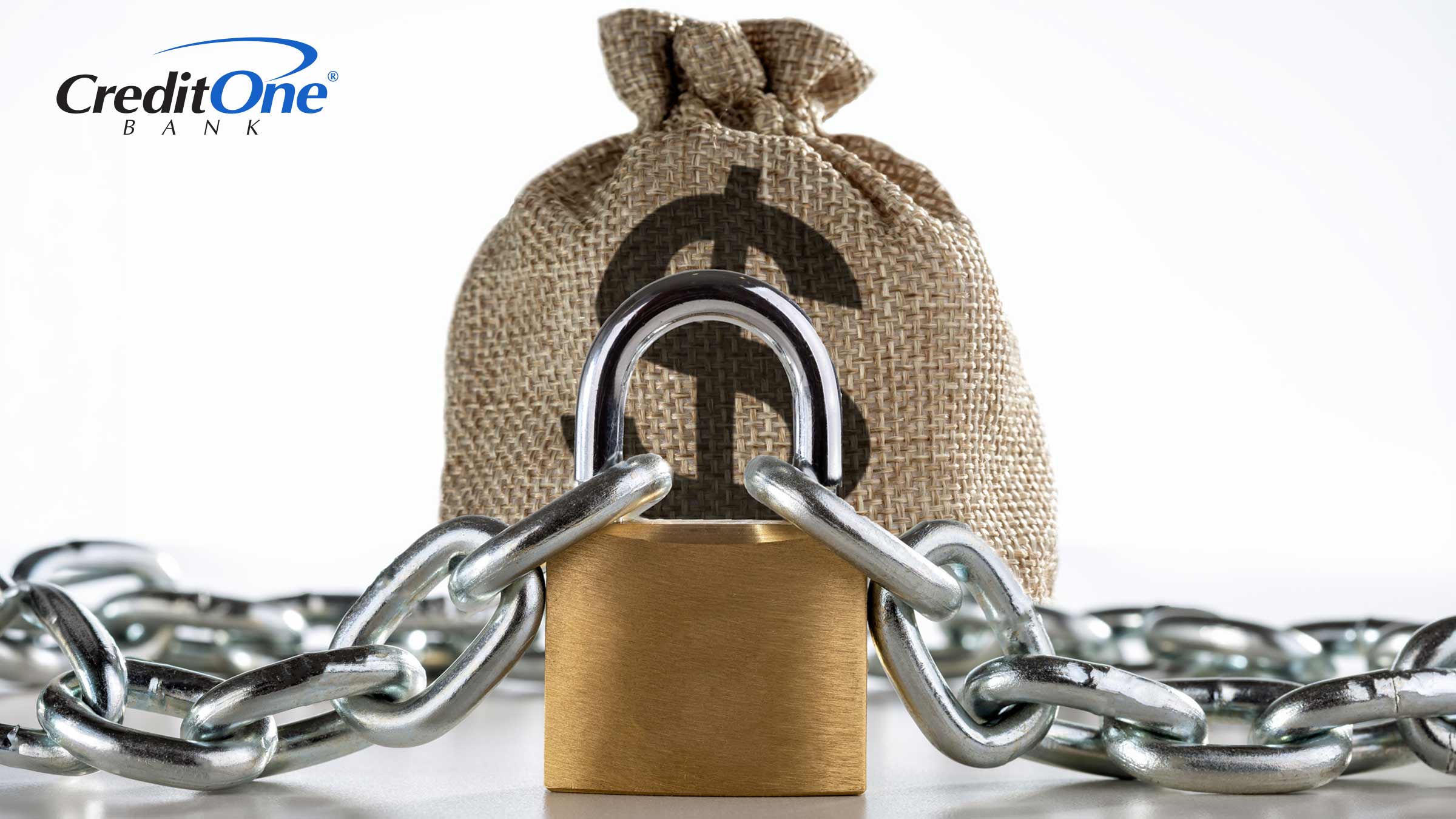 A chain and padlock are wrapped around a burlap bag with a dollar sign on it, representing the concept of locked fixed-term savings accounts.